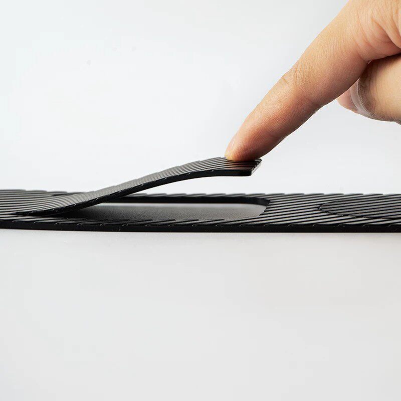 Adhesive door holder installed on a compatible interior door