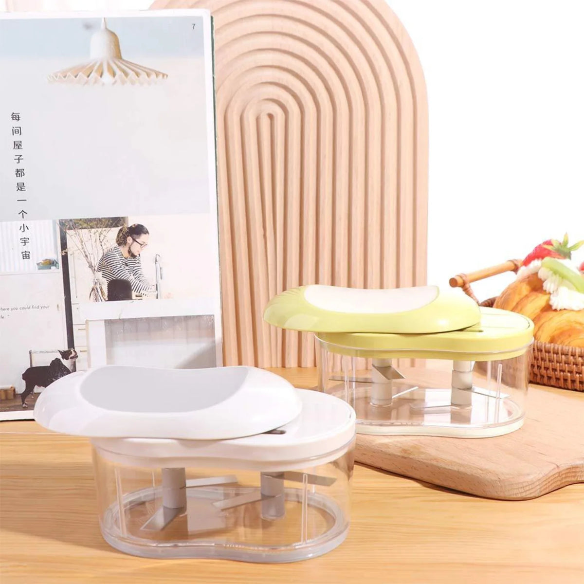Hand-push garlic prep tool shown from alternate angle