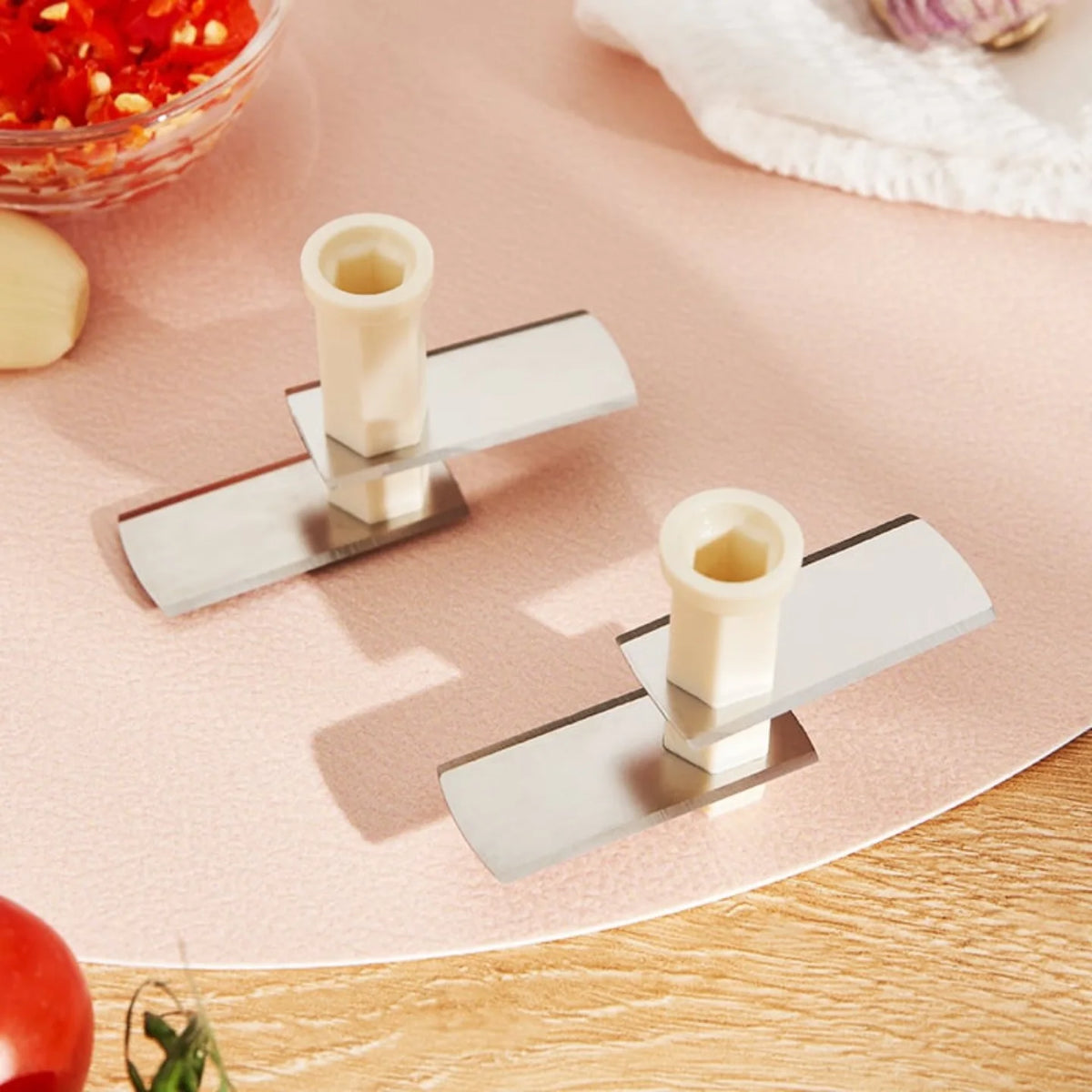 Compact kitchen garlic crusher in available color option