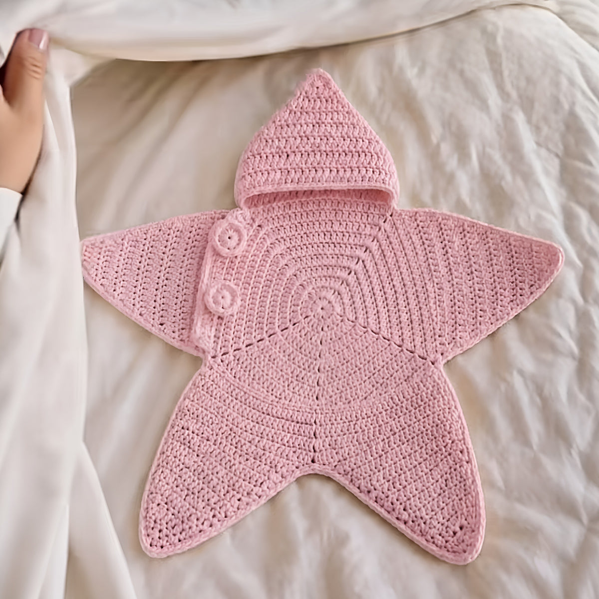 Star-shaped hooded baby romper in color option