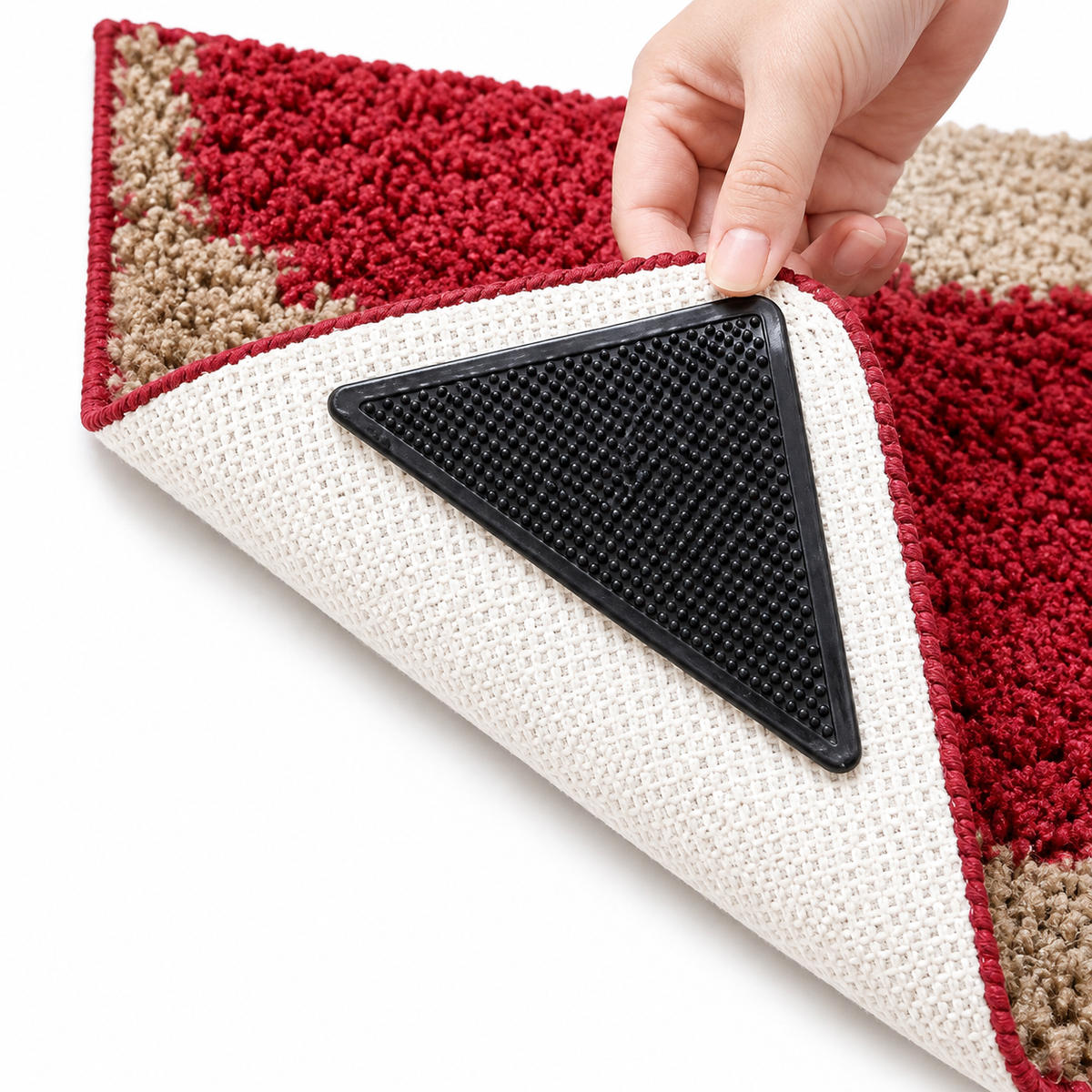 Rug corner lifted to show anti-slip rug gripper placement